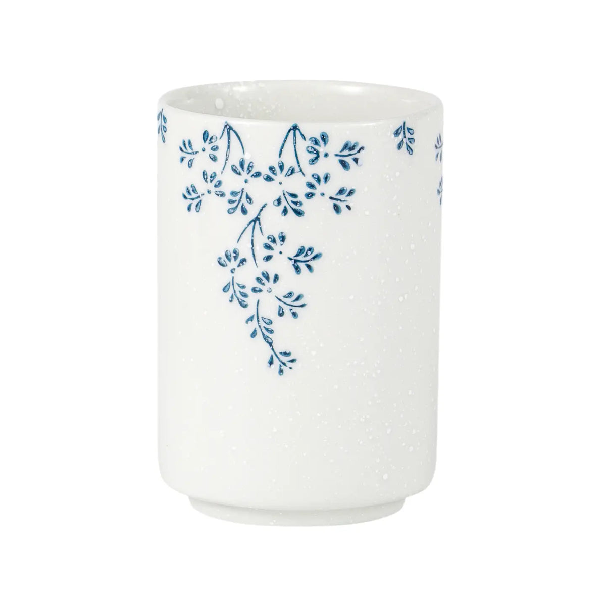 Taza de té de hojas y flores