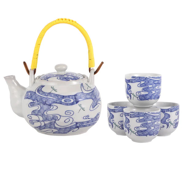 White and blue ceramic tea set with a 22 oz teapot and four cups, each adorned with a delicate blue dragonfly design. Teapot includes a bamboo handle for easy pouring