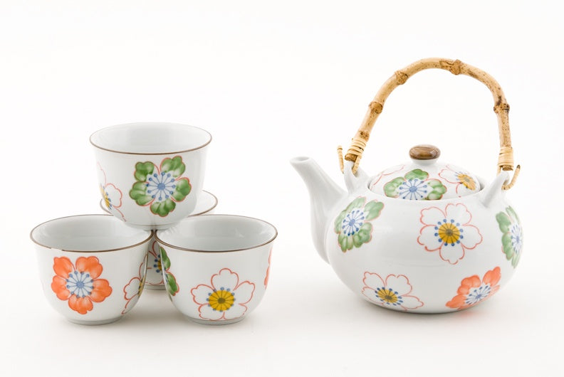 Juego de té de cerámica blanca con flores de colores