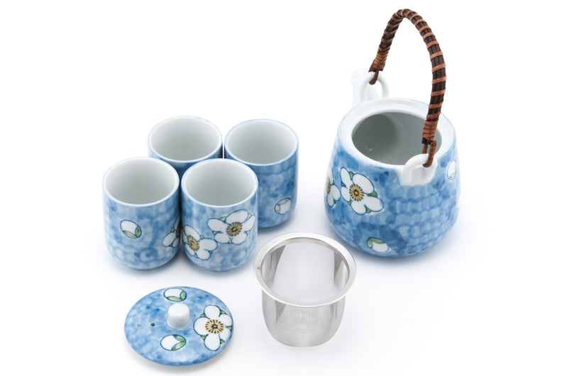Spring-inspired blue and white  tea set with floral design.