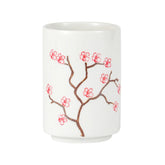 Taza de té de hojas y flores