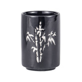 Taza de té de hojas y flores